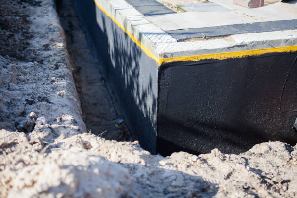 Professional Waterproofing technician working in Jamestown, KY